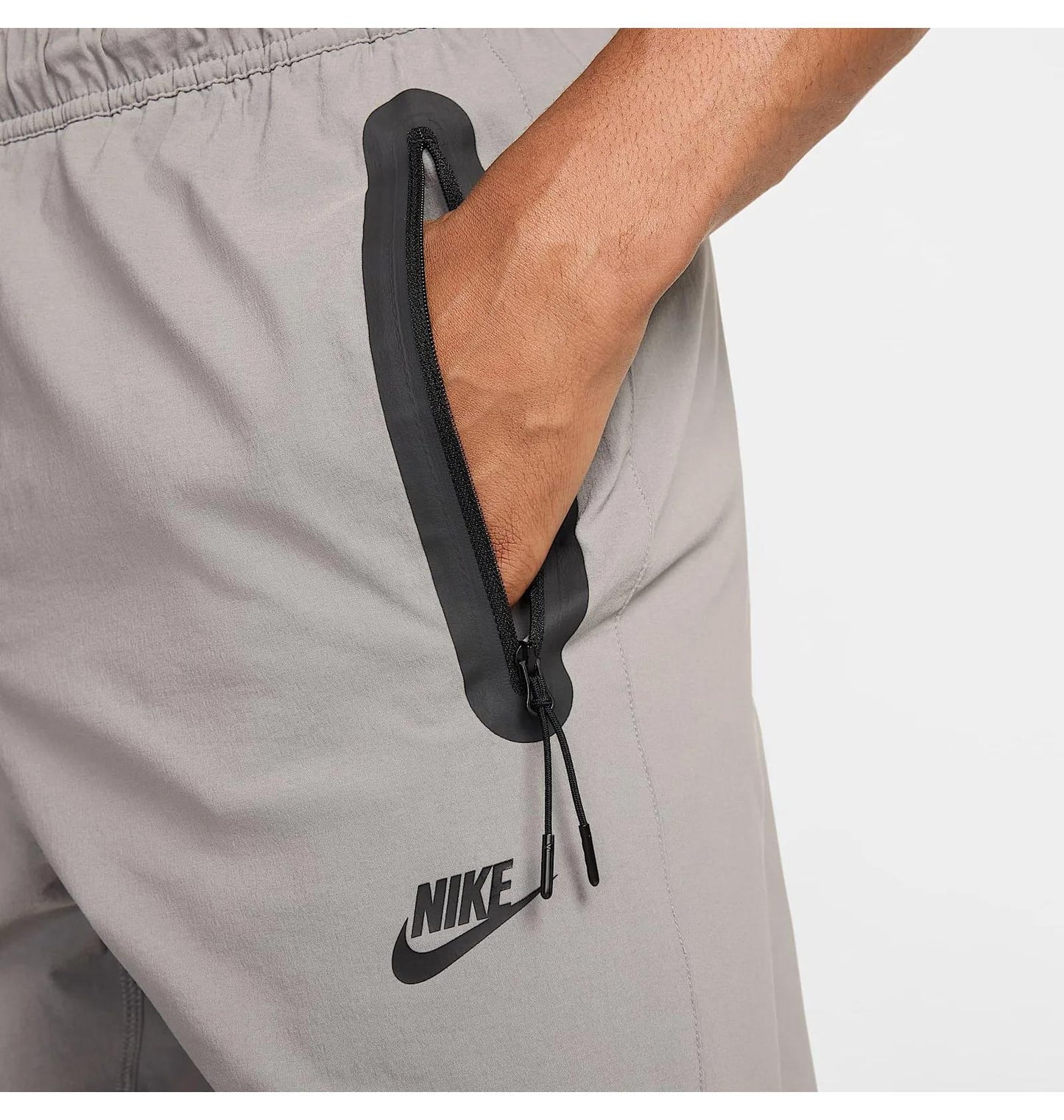 Брюки чоловічі Nike Tech Woven Grey (HM8241-014)