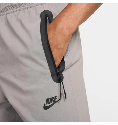 Брюки чоловічі Nike Tech Woven Grey (HM8241-014)